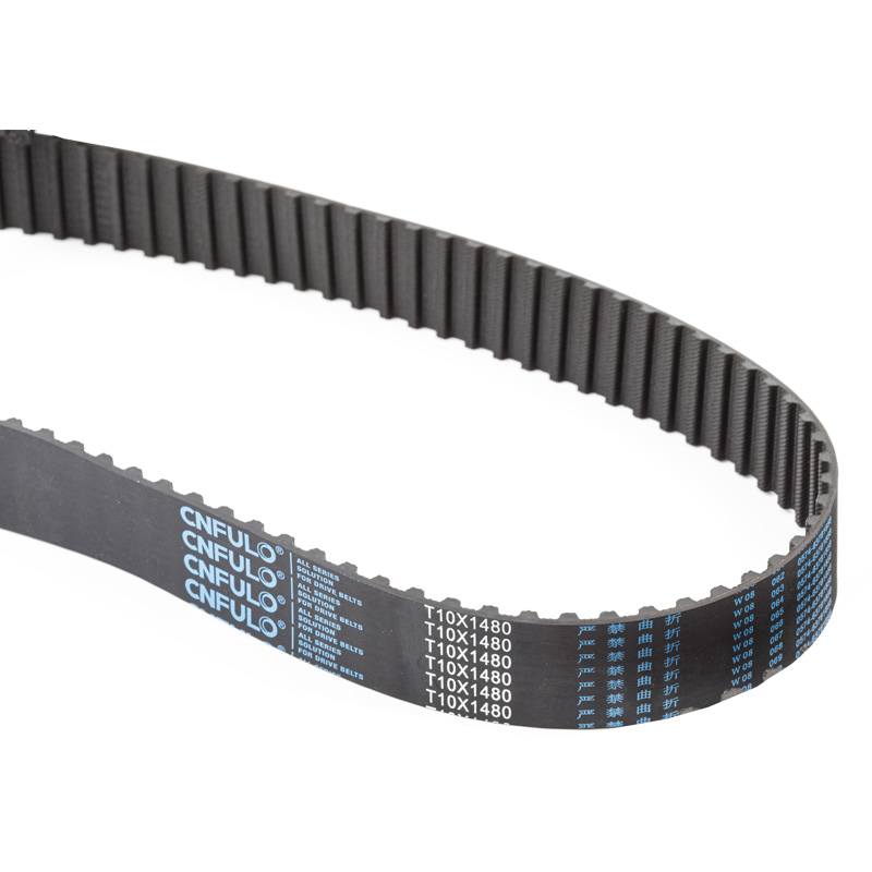 How the presence of a fabric cover on raw edge V belts impacts performance?